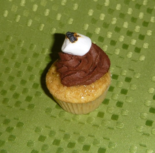 S'mores: Graham Cracker Cake filled with Marshmallow fluff and Topped with Smoked Chocolate Ganache