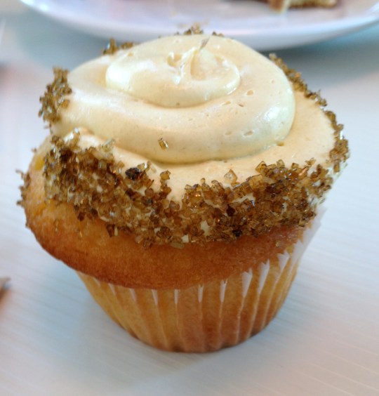 Crème Brûlée:  Our super moist vanilla cake is filled with pastry créme and topped with our own Crème brûlée Italian Buttercream and a caramelized sugar shard.