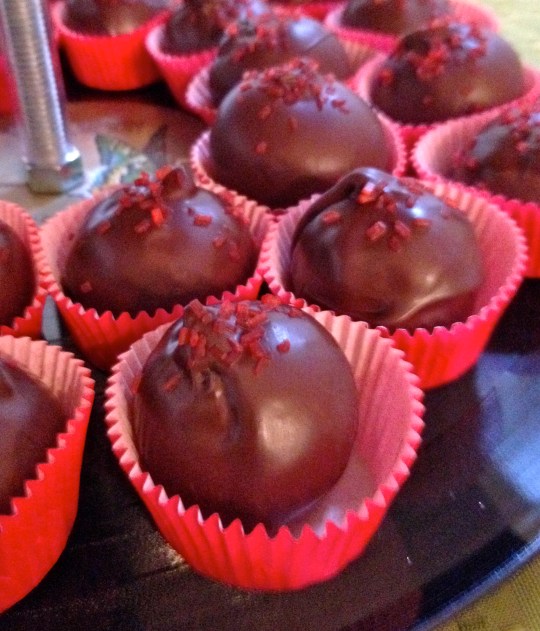 Female of The Species: Cherry cake mixed with mascarpone white chocolate ganache and coated in dark chocolate. 