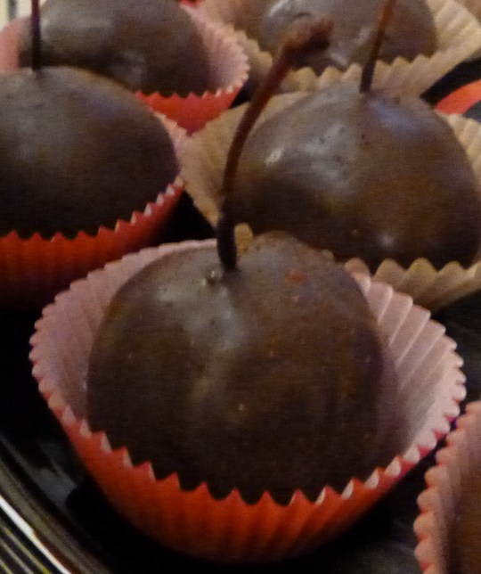 Demonology of Desire: Cherry cake mixed with dark chocolate wrapped around a chipotle infused cherry, dipped in dark chocolate and sprinkled with chipotle. 